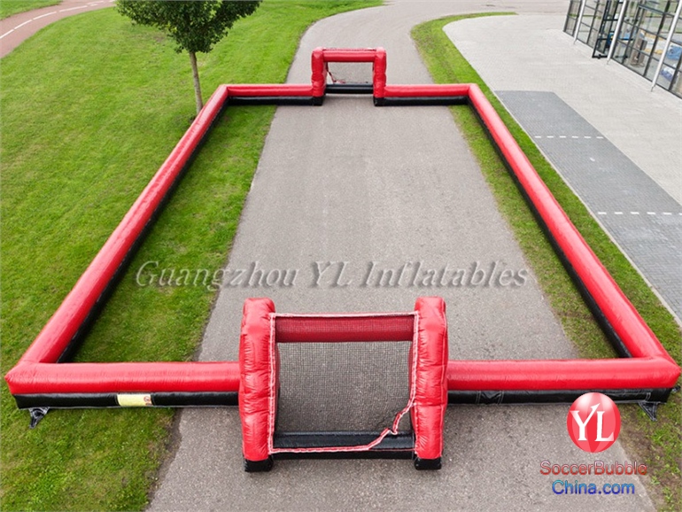Inflatable red human bumper bubble field